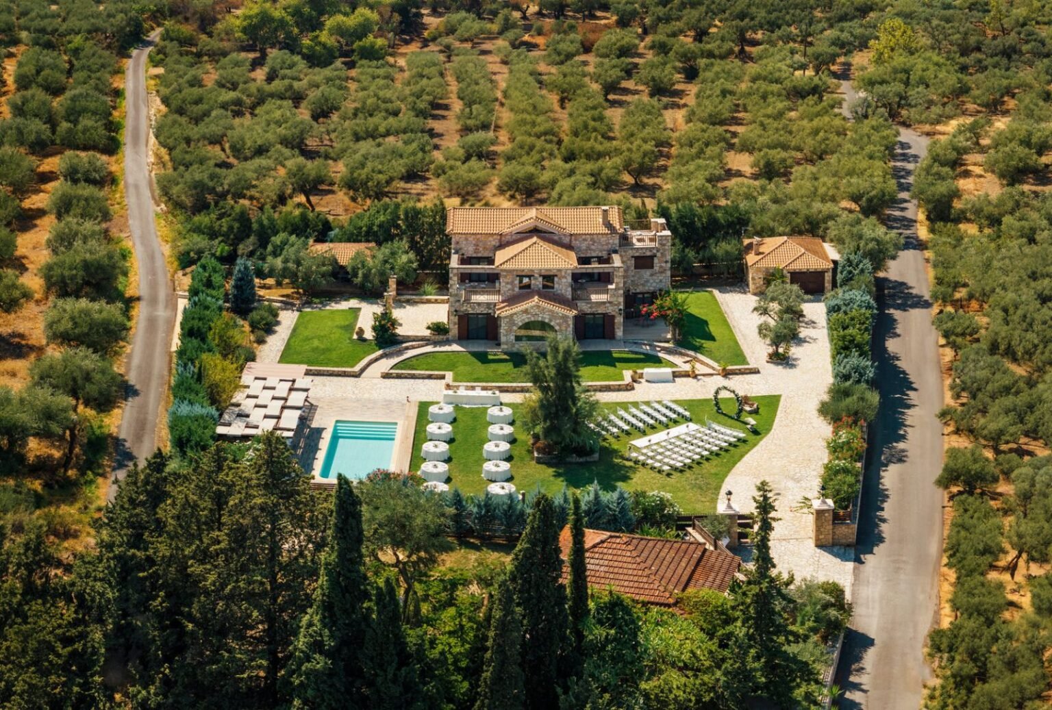 Lush gardens surrounding Palazzo di P, a dreamy wedding venue in Greece