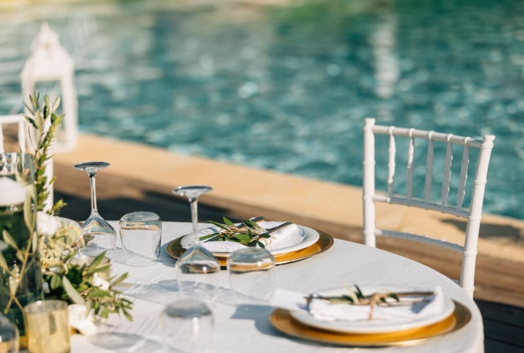 Close-up of elegant wedding table decor at Palazzo di P with floral arrangements and fine dining settings