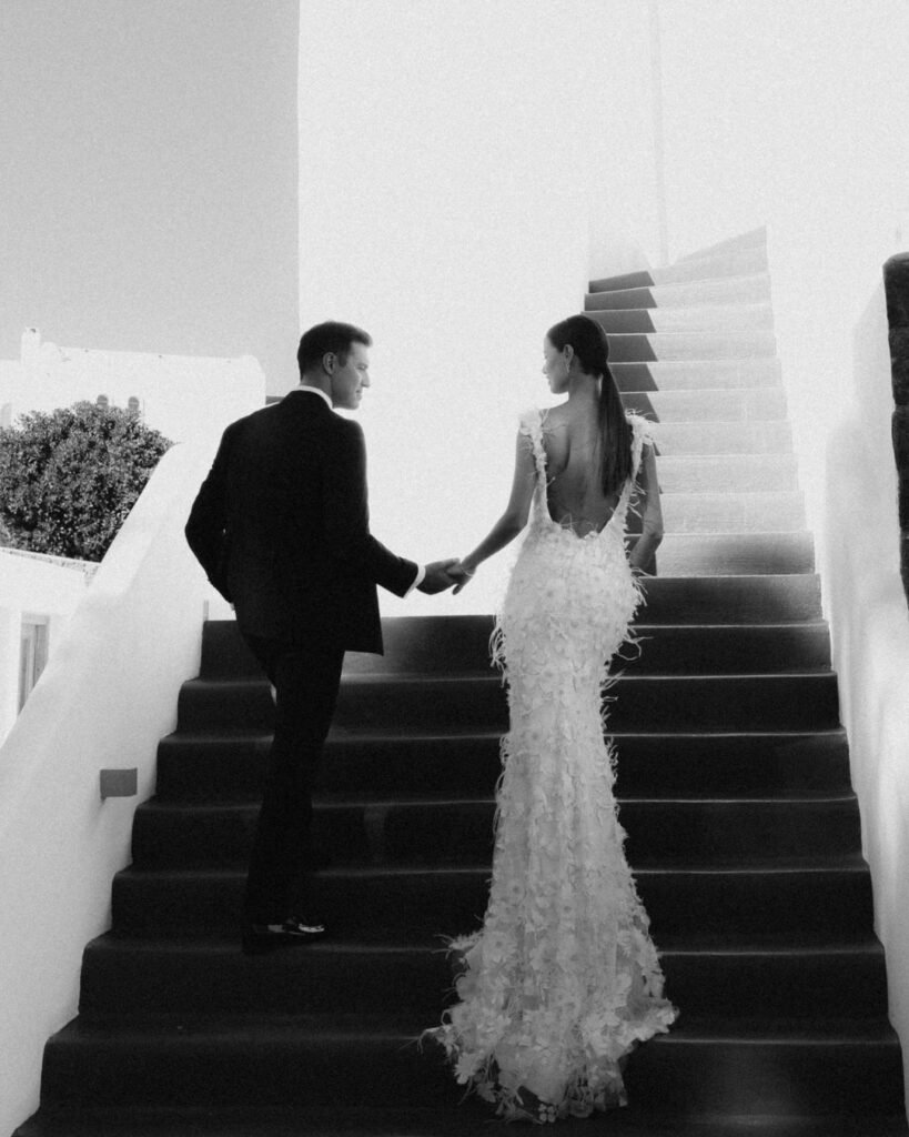 The couple sharing a moment at their beautifully set wedding reception at Venetsanos Winery.