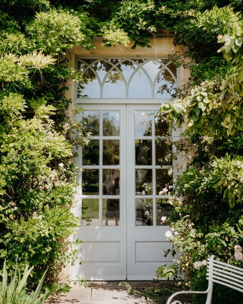 A stunning ivy-covered building at Euridge Manor, blending historic architecture with natural beauty.