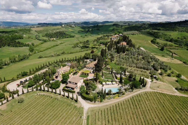 Tenuta Corbinaia exterior showcasing the stunning Tuscan villa surrounded by vineyards