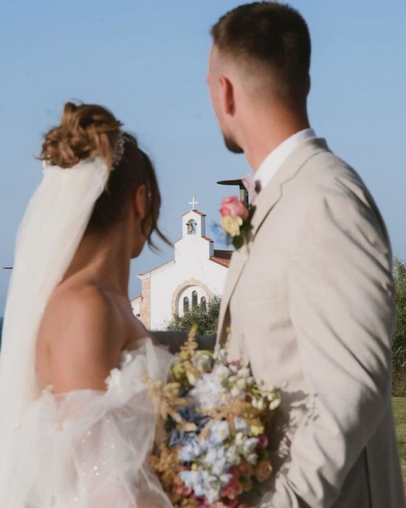 Groom's portrait taken at Cavo Zoe in Cyprus, with the venue's stylish design as a backdrop.