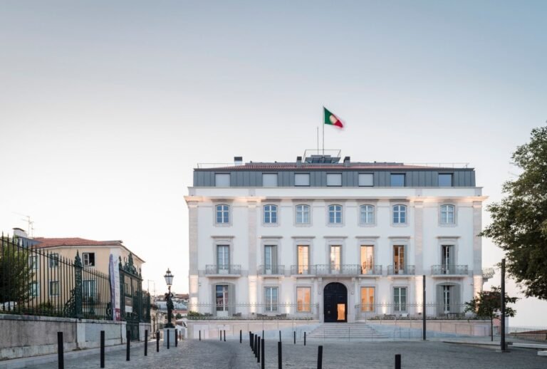 Stunning front view of Verride Palácio Santa Catarina in Lisbon, Portugal, with historic architectural elegance and lush greenery.