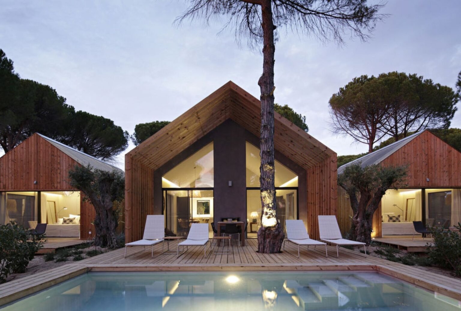 Front view of the main entrance at Sublime Comporta in Portugal, showcasing the charming blend of nature and architecture.