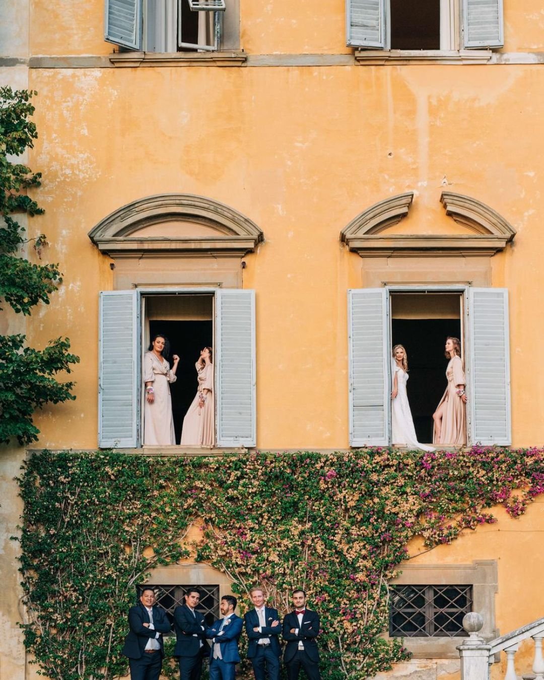 Bride and groom captured in a vintage-style wedding portrait.