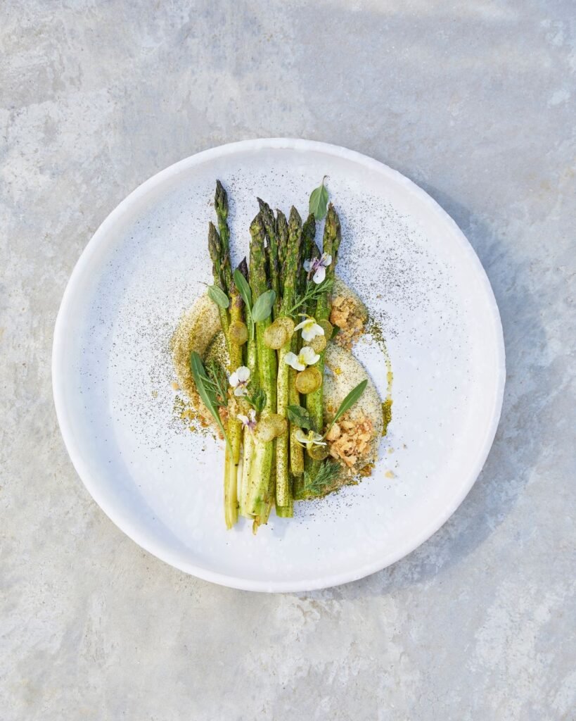 A delicately plated dish at Masseria Morosetta, reflecting the simplicity and elegance of Italian cuisine, photographed by Renee Kemps.