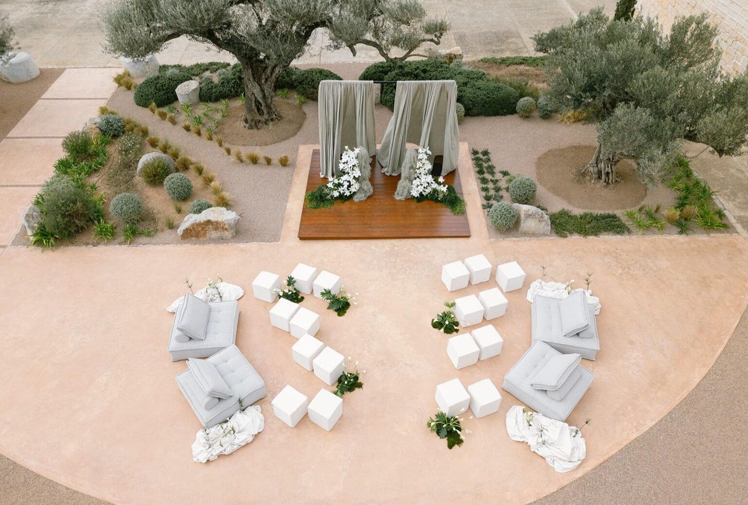 Aerial view showcasing contemporary seating arrangement and altar decor at Finca Morneta.
