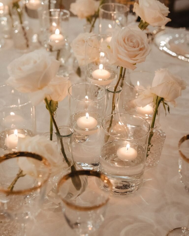 Floating candles create a warm, romantic ambiance at Villa Donna Camilla’s wedding reception.