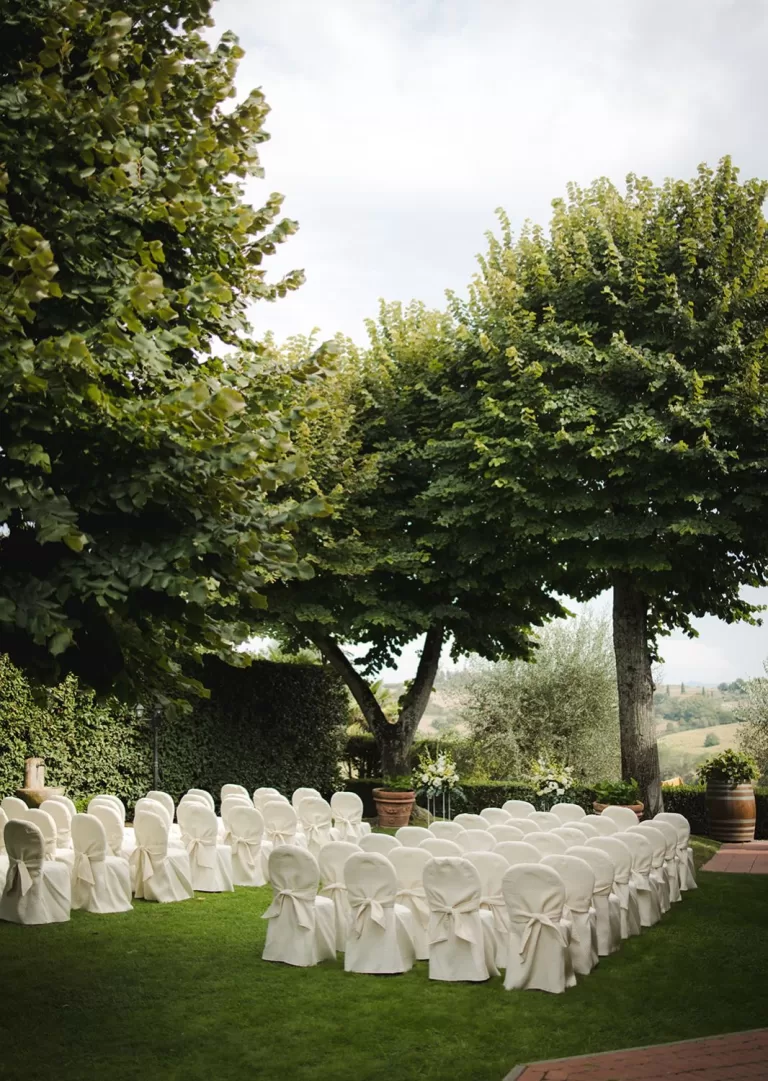 Peaceful ceremony garden with views of the Tuscan hills at Borgo Tre Rose.