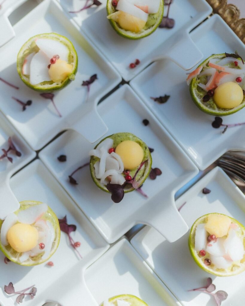 Creative lime cup canapés served on modern square plates at Villa Ivana wedding reception.