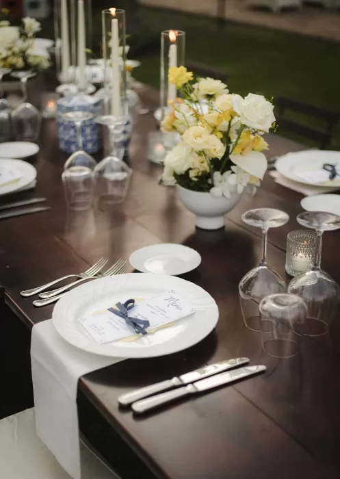 Elegant wedding table set with flowers and candles at Borgo Tre Rose