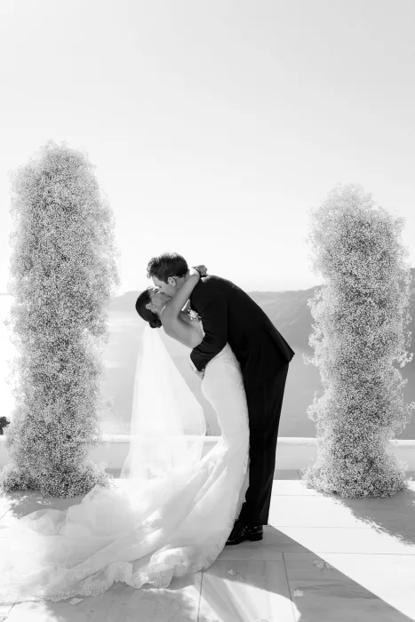 Wedding ceremony setup facing the Aegean Sea, with minimalist elegance at Rocabella Santorini