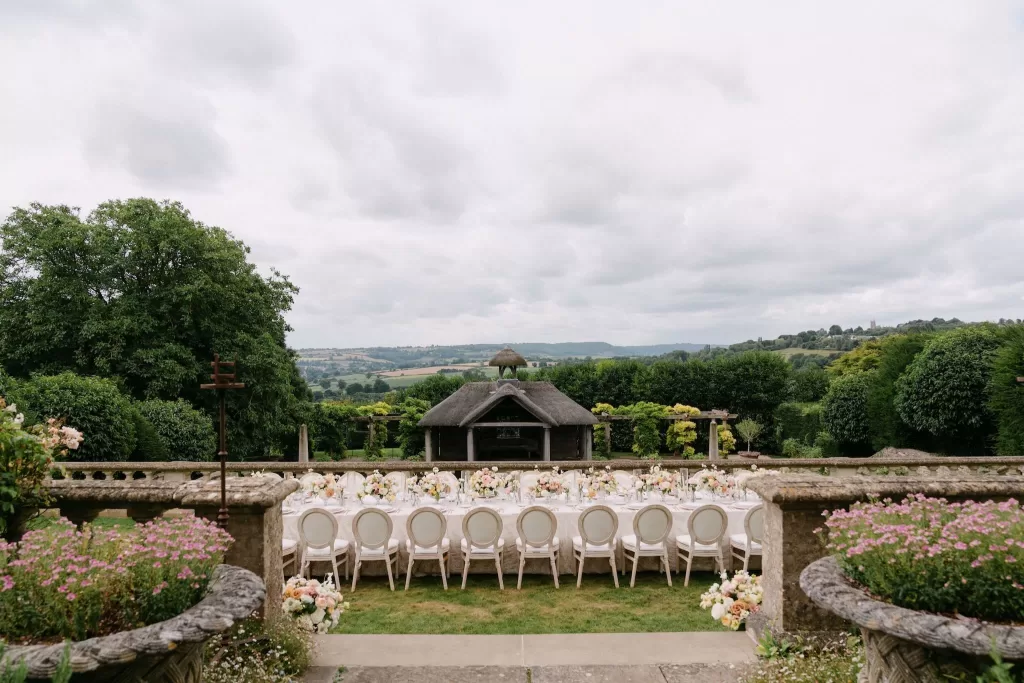 Scenic view of the wedding dining setup with countryside backdrop at Euridge Manor.