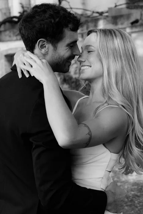 Romantic black and white portrait of the couple smiling face to face at Finca Son Sampol.