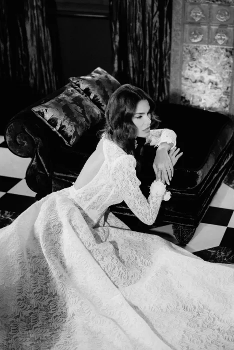Bride reclining on vintage lounge at Villa Clara