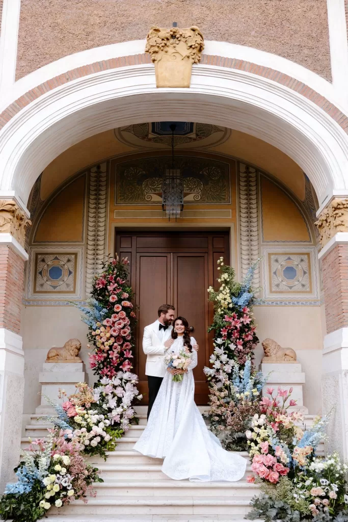Couple framed by arched doorway at Villa Clara