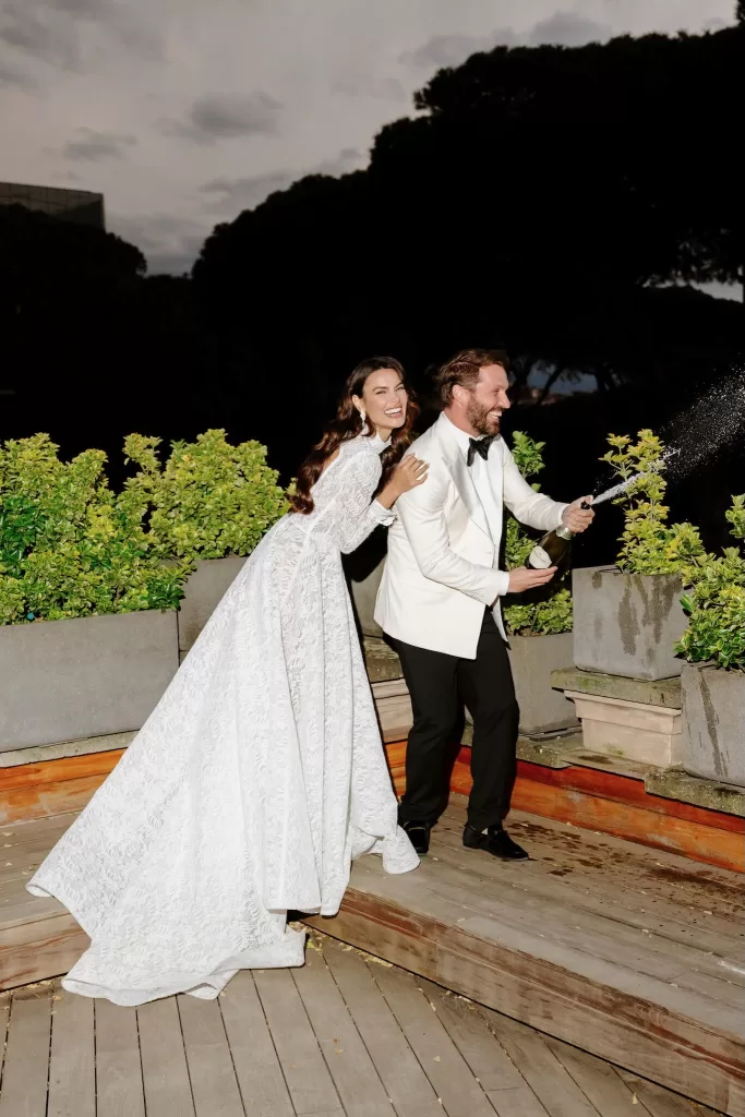 Newlyweds sharing a champagne toast at Villa Clara