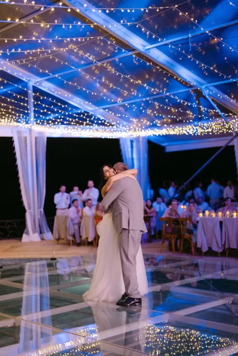 Emotional first dance under a canopy of fairy lights at Villa La Joya’s reception.
