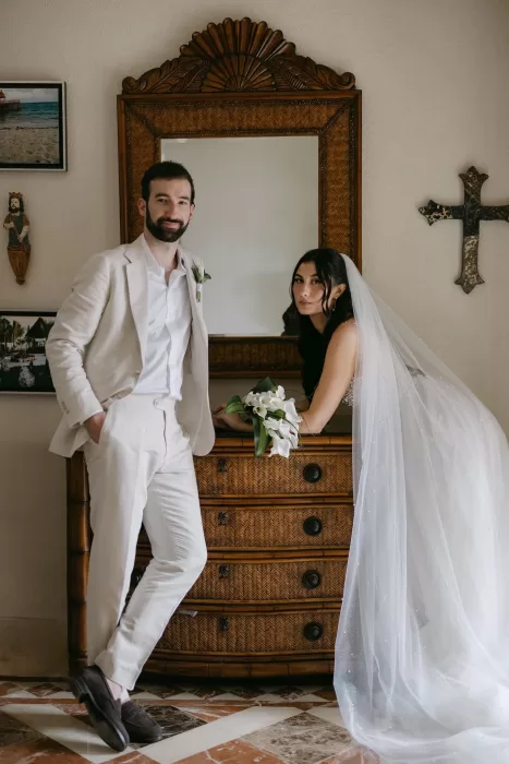 Bride and groom sharing a quiet moment before the ceremony inside Villa La Joya.