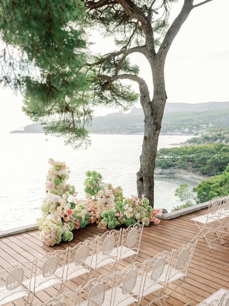 Ceremony floral installation overlooking the Mediterranean Sea at Domaine de Canaille