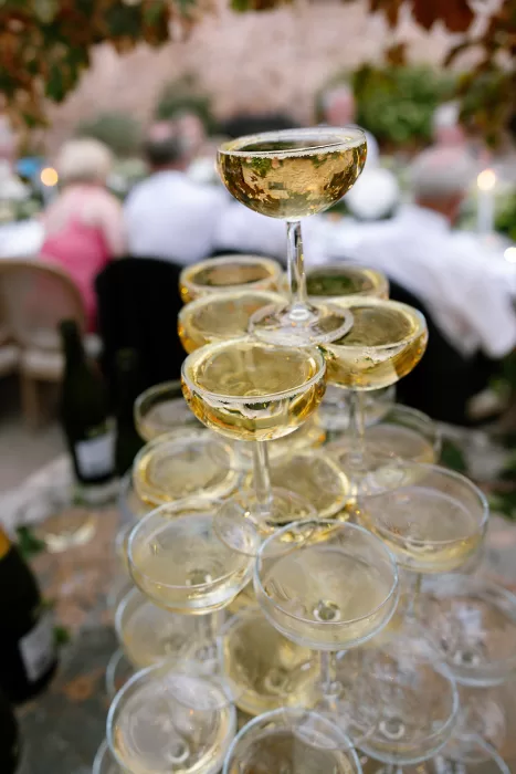 Tower of champagne coupes ready for toasts during the reception at Cases de Sa Fonseca.