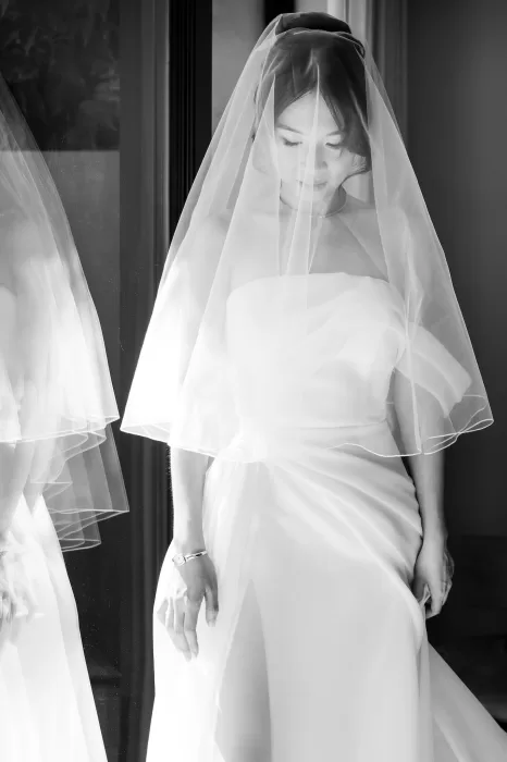 Black and white portrait of bride in veil before the ceremony at Six Senses Douro Valley.