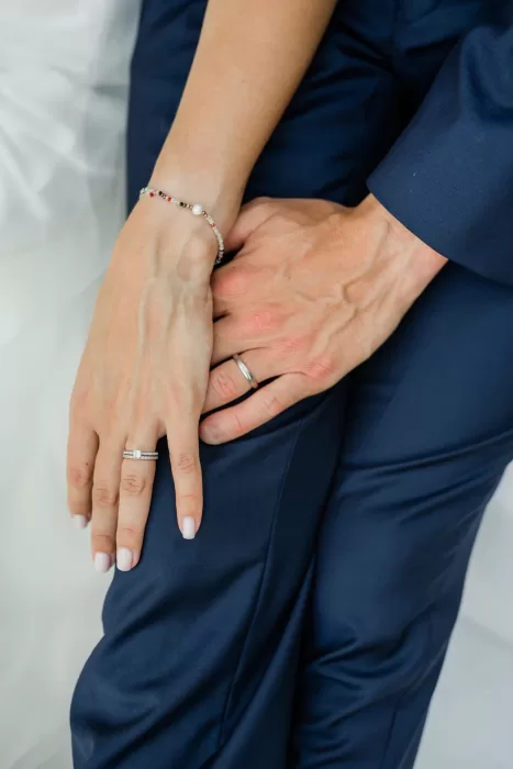Close-up of couple’s hands showing wedding rings after the ceremony at Finca la Concepción.