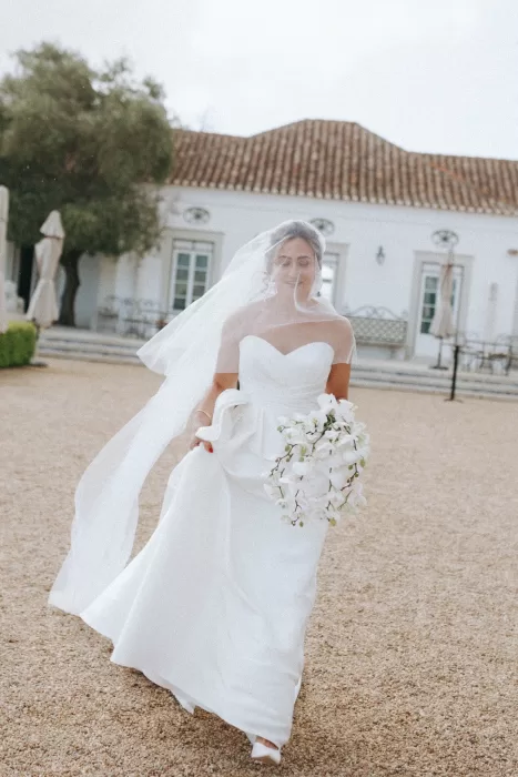 Bride under her veil moments before the ceremony at Herdade do Peru, an intimate and emotional black-and-white portrait.