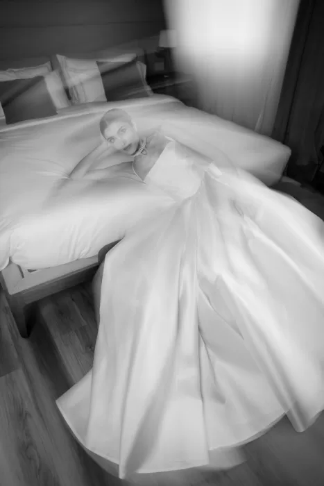 Artistic black-and-white bridal portrait with flowing gown captured in soft motion at Villa Buttafava.