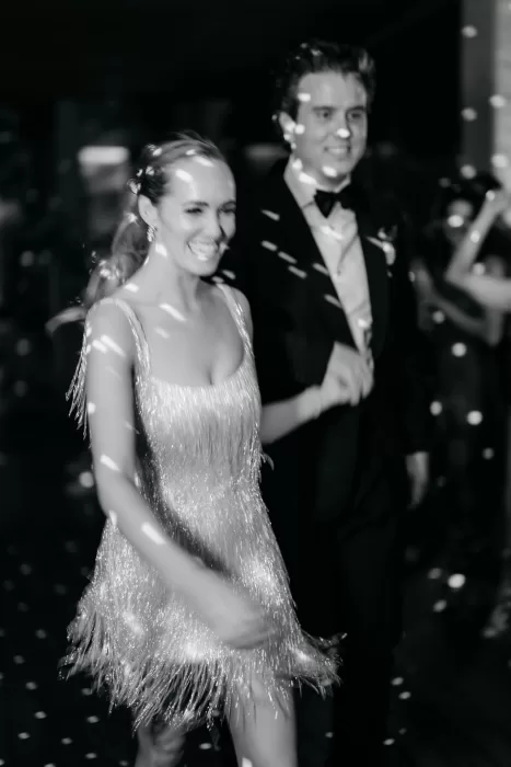Bride and groom dancing together during the evening celebration at Areias do Seixo, captured in black and white.