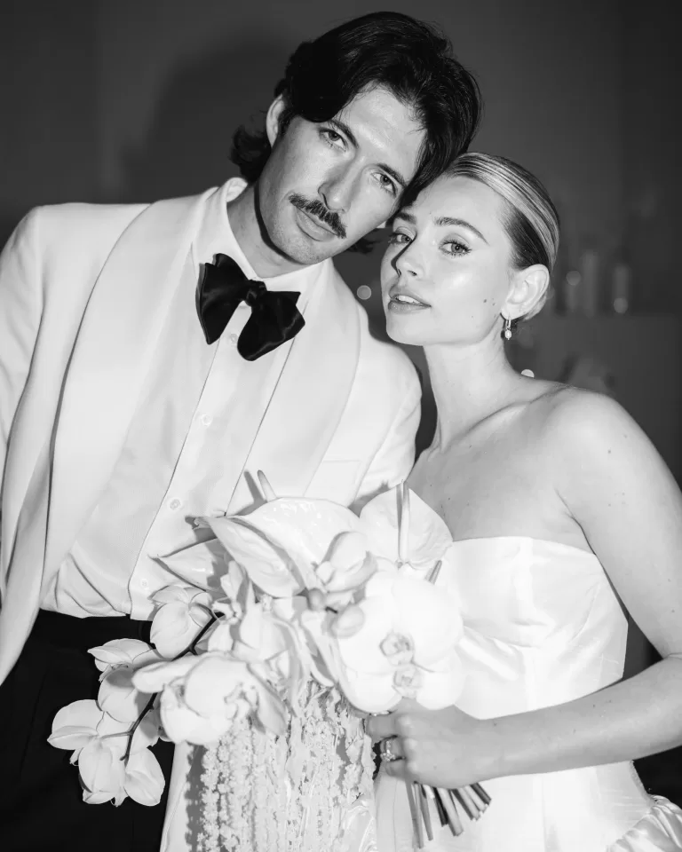 Bride and groom portrait at Fontsanta indoors with candlelit floral installations and a refined, modern atmosphere.