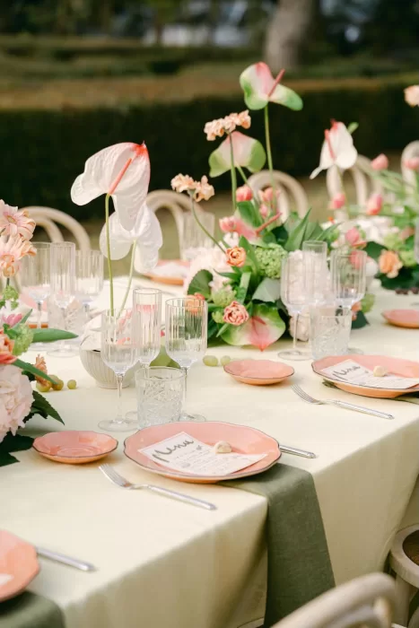 Garden wedding table styling at Fontsanta featuring pastel florals, soft linens and relaxed outdoor dining.