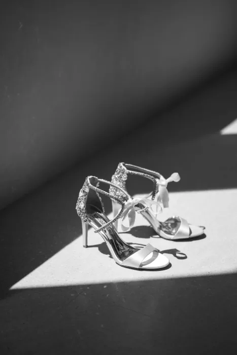 Bridal heels with crystal details photographed in soft natural light during a wedding at Islet Santorini.