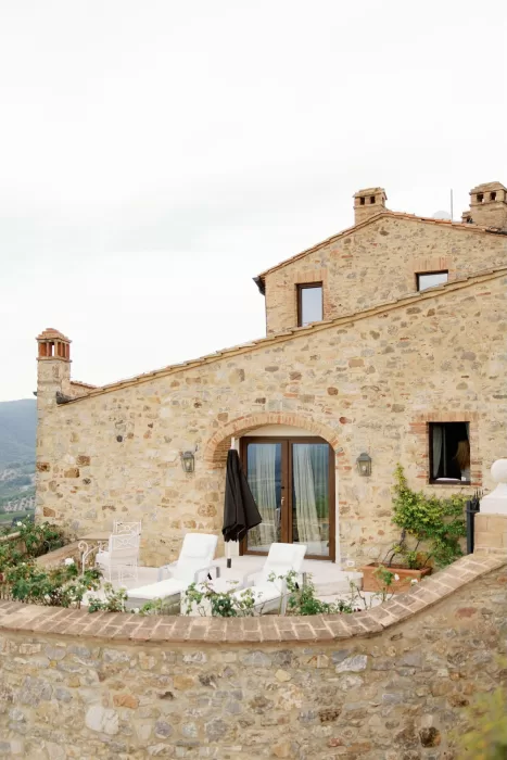 Stone-built suite terrace with countryside views at Castello di Velona.