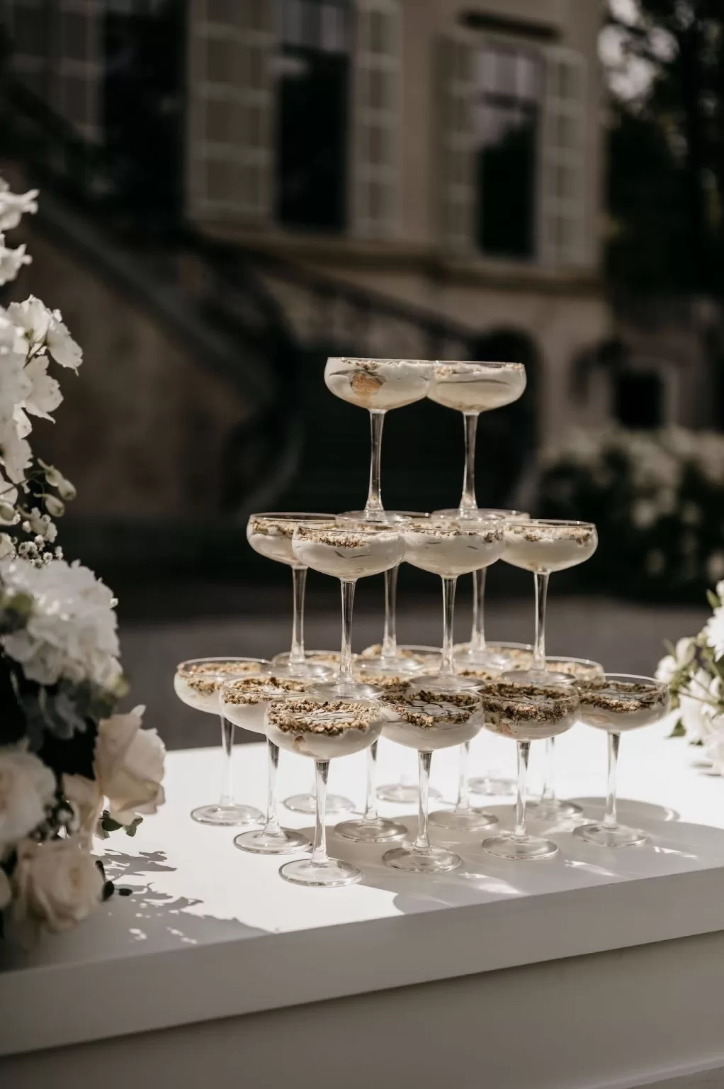 Elegant champagne tower ready for wedding celebrations at Parc Broekhuizen.