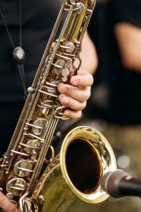 Close-up of saxophone being played during wedding reception at Castello di San Fabiano