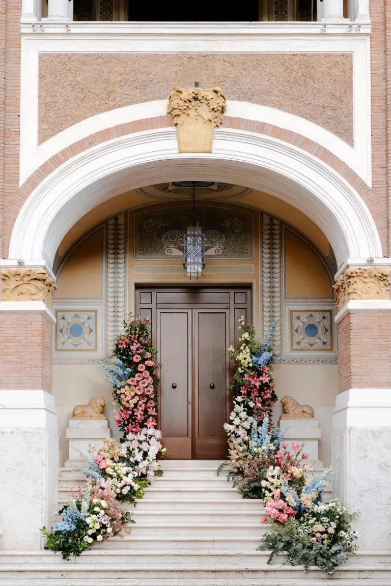 Flower-adorned entranceway at Villa Clara